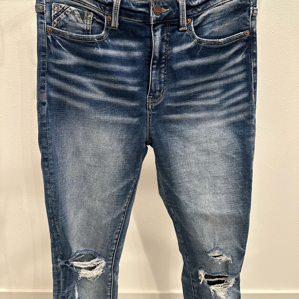 Buckle Black Distressed Blue Jeans